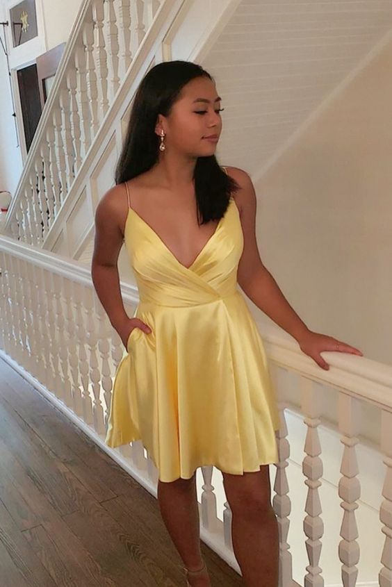 short homecoming dress in yellow color with pocketes and straps cg2957